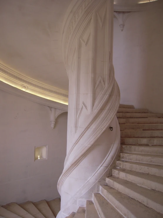the staircase of a building that looks very elegant