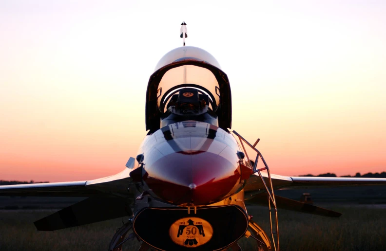 closeup of the nose and wing of a small plane