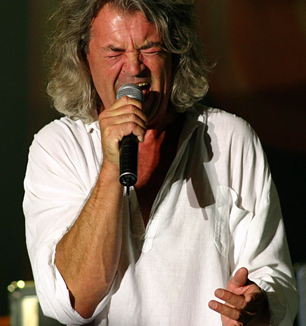 an image of a man with a microphone