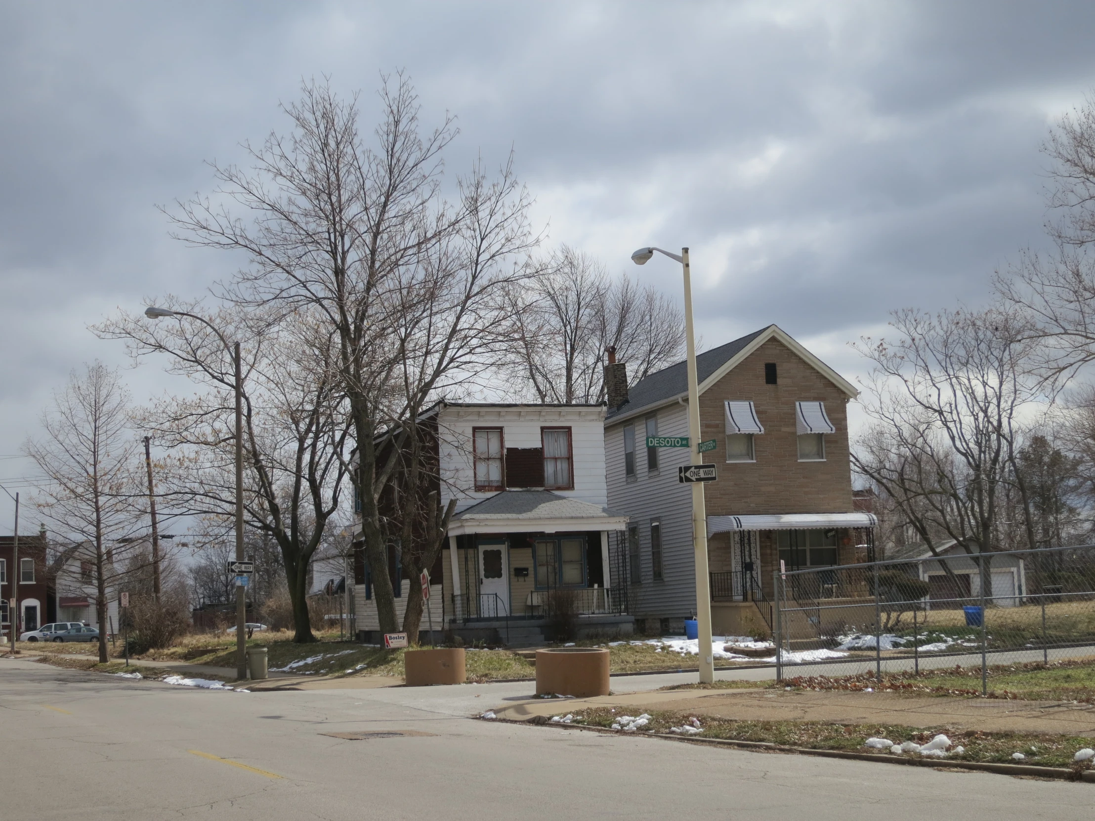 some houses with a street light next to them