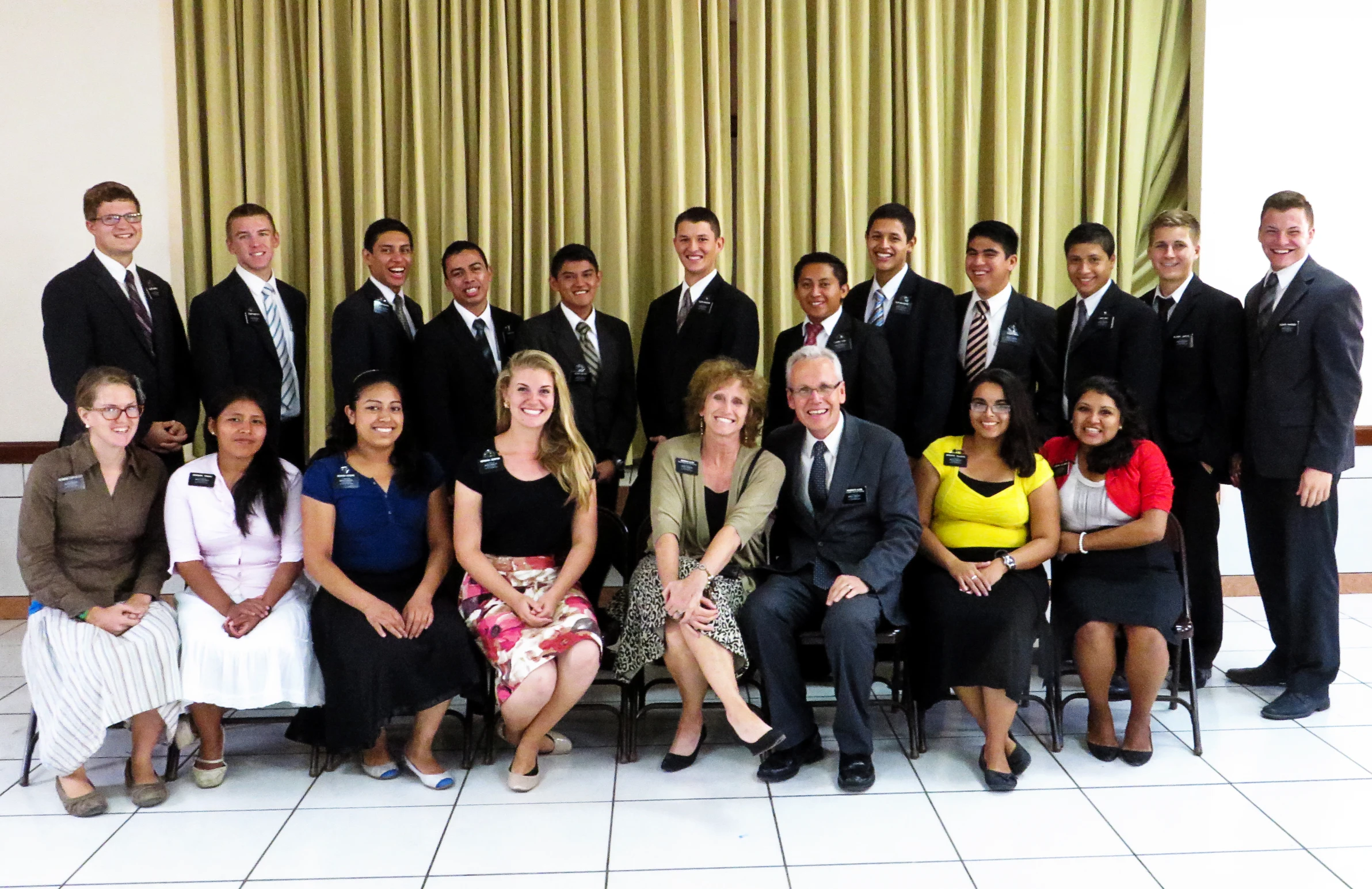 an office group poses for a picture before attending