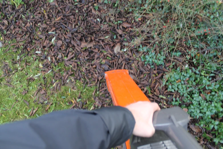 a man taking a pograph of a bench