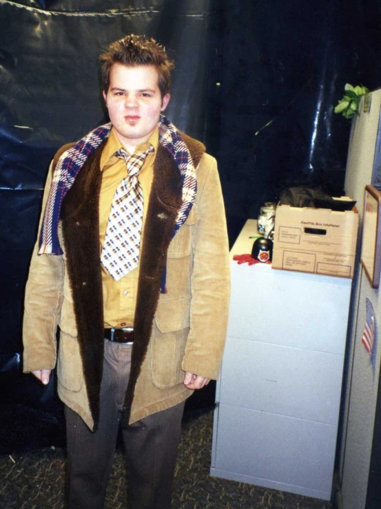 a man is dressed up in costume posing for the camera