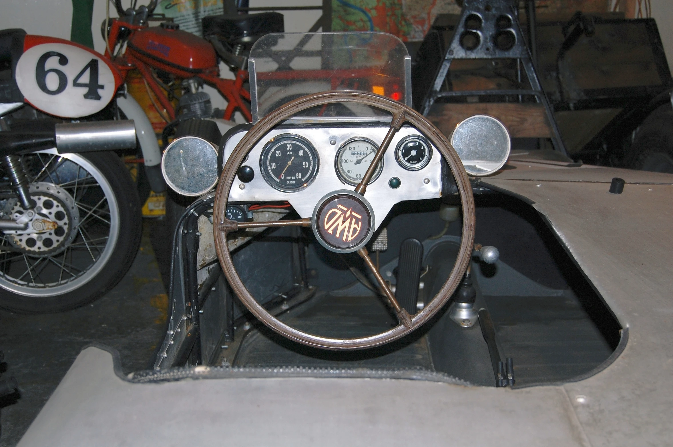 a dashboard and steering wheel in a race car