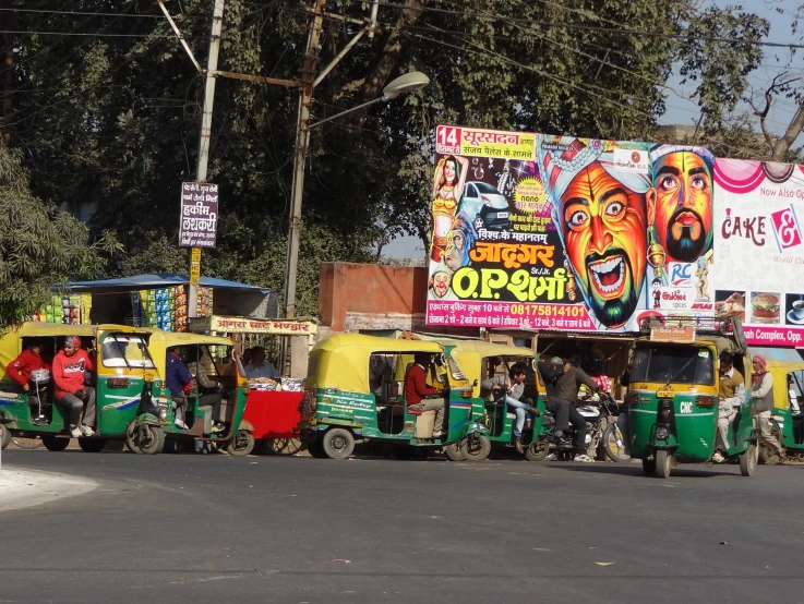 vehicles are lined up on the side of a road