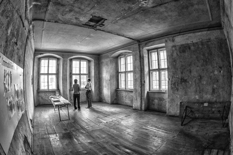 a person standing next to a doorway in a room