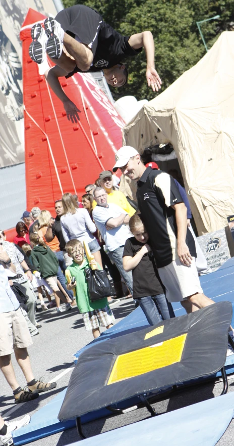 the skateboarder does a trick at a competition