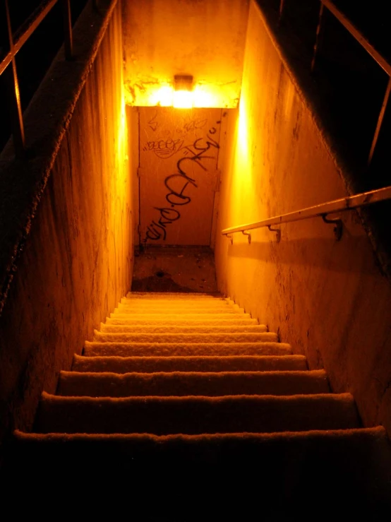 empty dark room with graffiti on walls