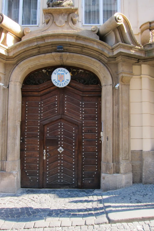 a very big pretty door in a big building