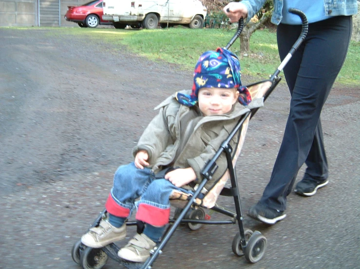 a small child is being hed by a woman