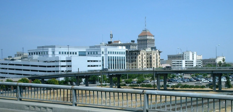 a bridge and some buildings in the distance