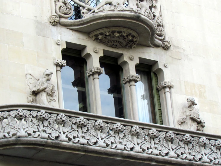 windows with carved iron and glass on a building