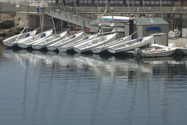 a bunch of boats docked in the water