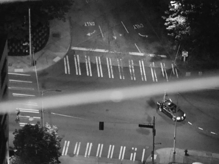 an aerial view of a motorcycle rider at the corner