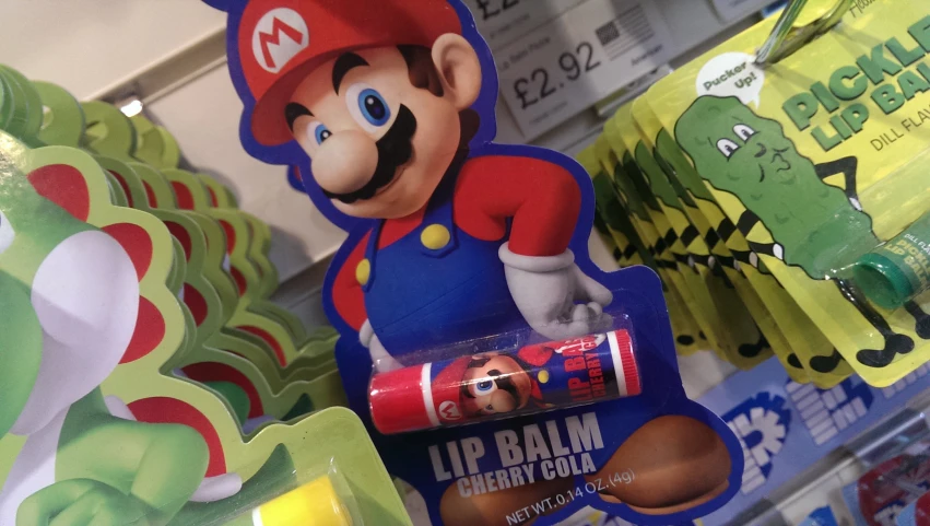 a mario balloon ad is shown behind other products
