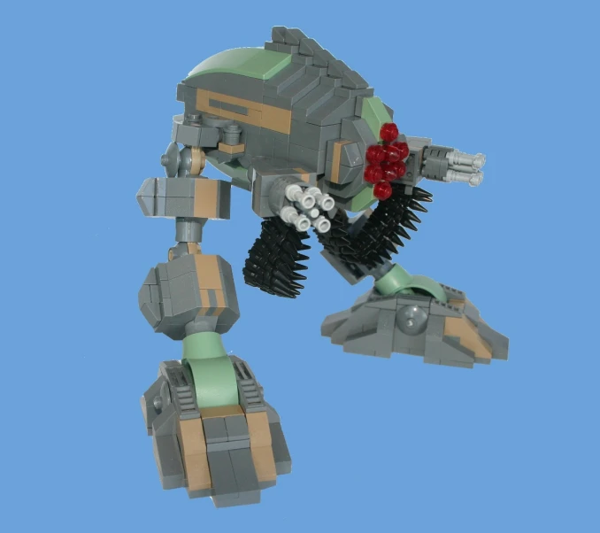 an open s of a lego robot with guns and wheels