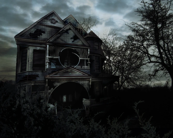 an old house with a big clock on it