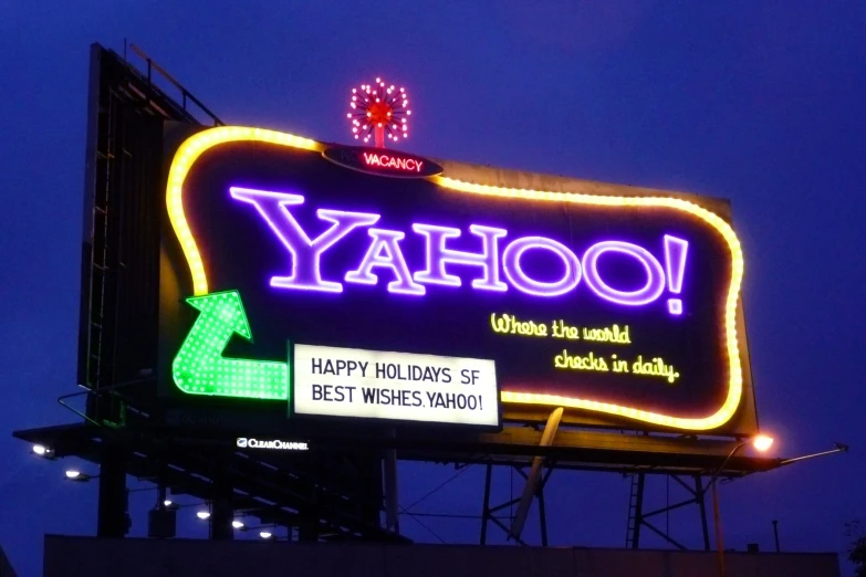 a yahoo advertising is shown as the dark sky looks on