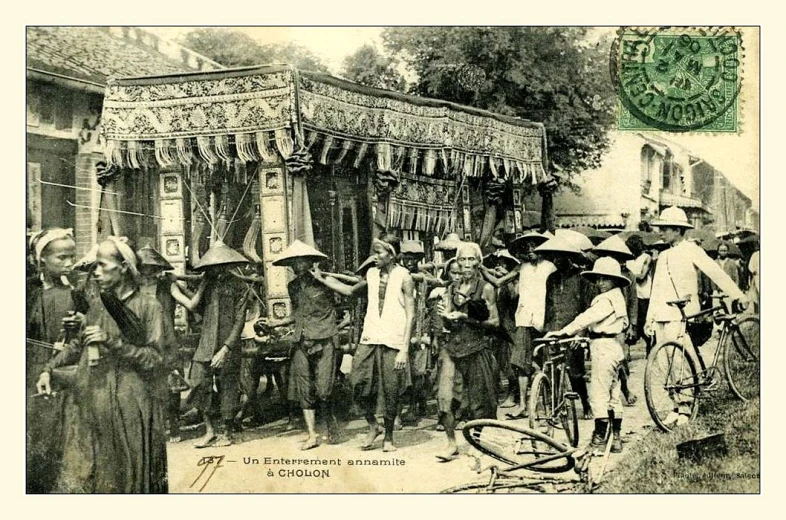 an old black and white image of people with umbrellas