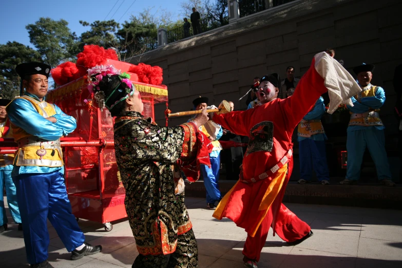 a group of people with their hands out in front of a crowd