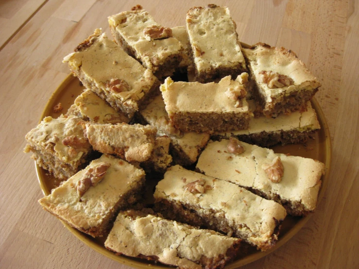 a plate full of cut up cake in chunks