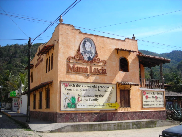 an old building with a clock on top of it