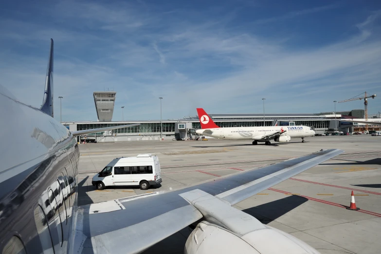 an air plane that is parked on the runway