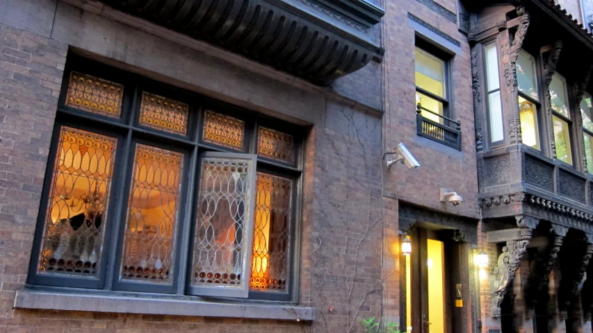 an old style brick building with fancy windows