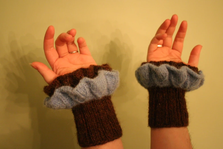 handmade wool mitts that resemble human fingers