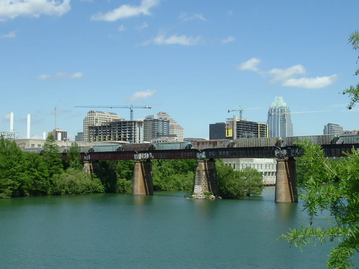 a bridge is over the water in the city