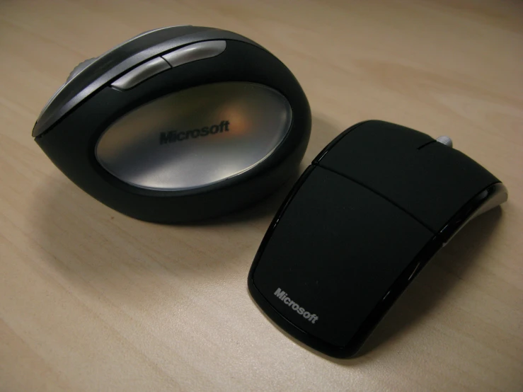 a microsoft mouse and a microsoft mouse are placed together