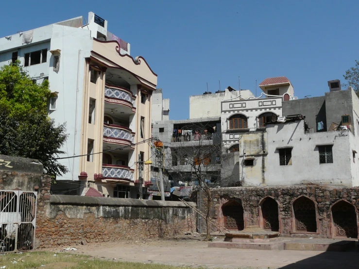 the city street has buildings with balconies on them