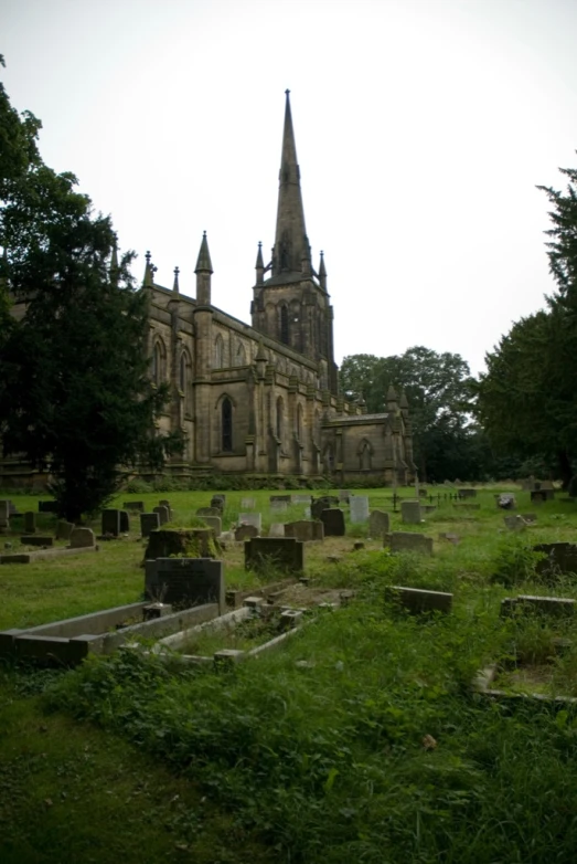 an old cemetery in front of a building