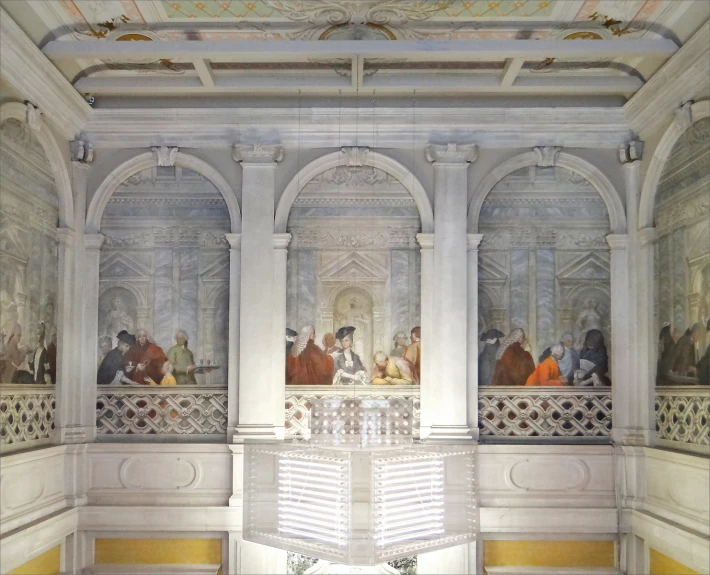 an ornately decorated room with two tables with chairs