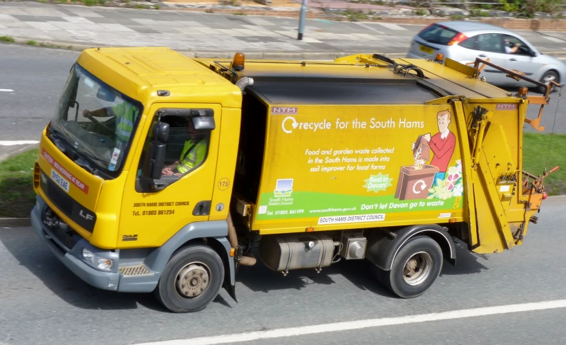 a truck on the street near some cars