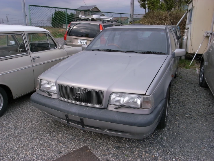 a car is parked next to another car