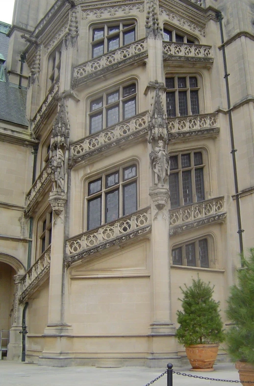 a clock is displayed in front of an old building