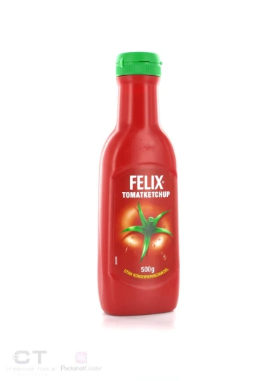 a bottle of red liquid with green top