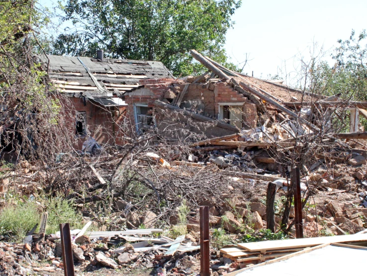 there is a small building with debris all over it