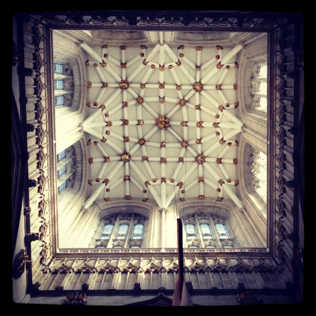 a ceiling with lights that are on inside of it