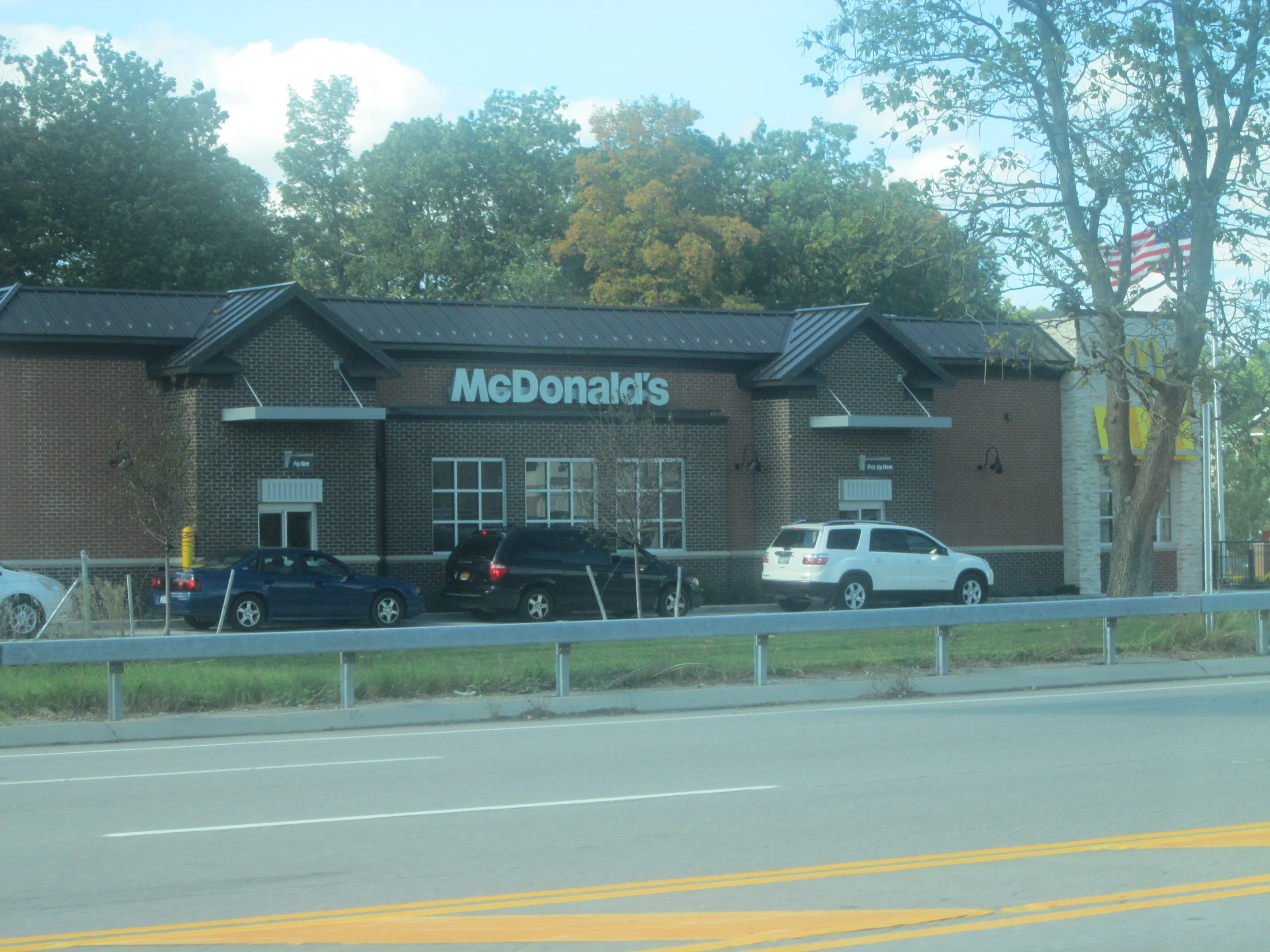 a large building sitting next to a street