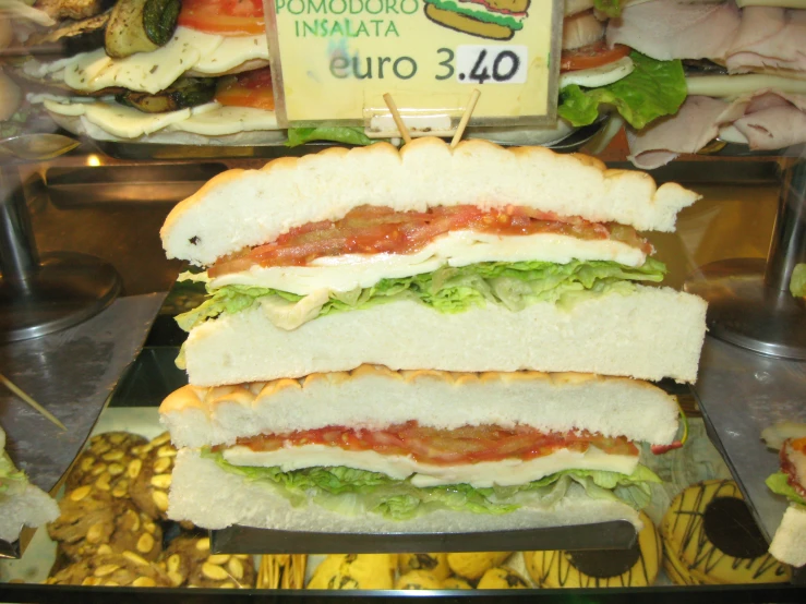 there are many different sandwiches on this display