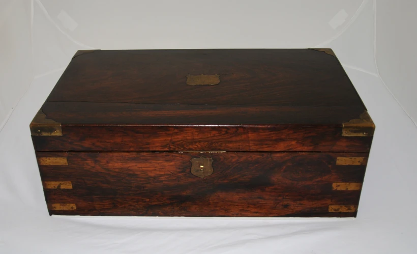 this is an old, wooden chest that could be used as a toy