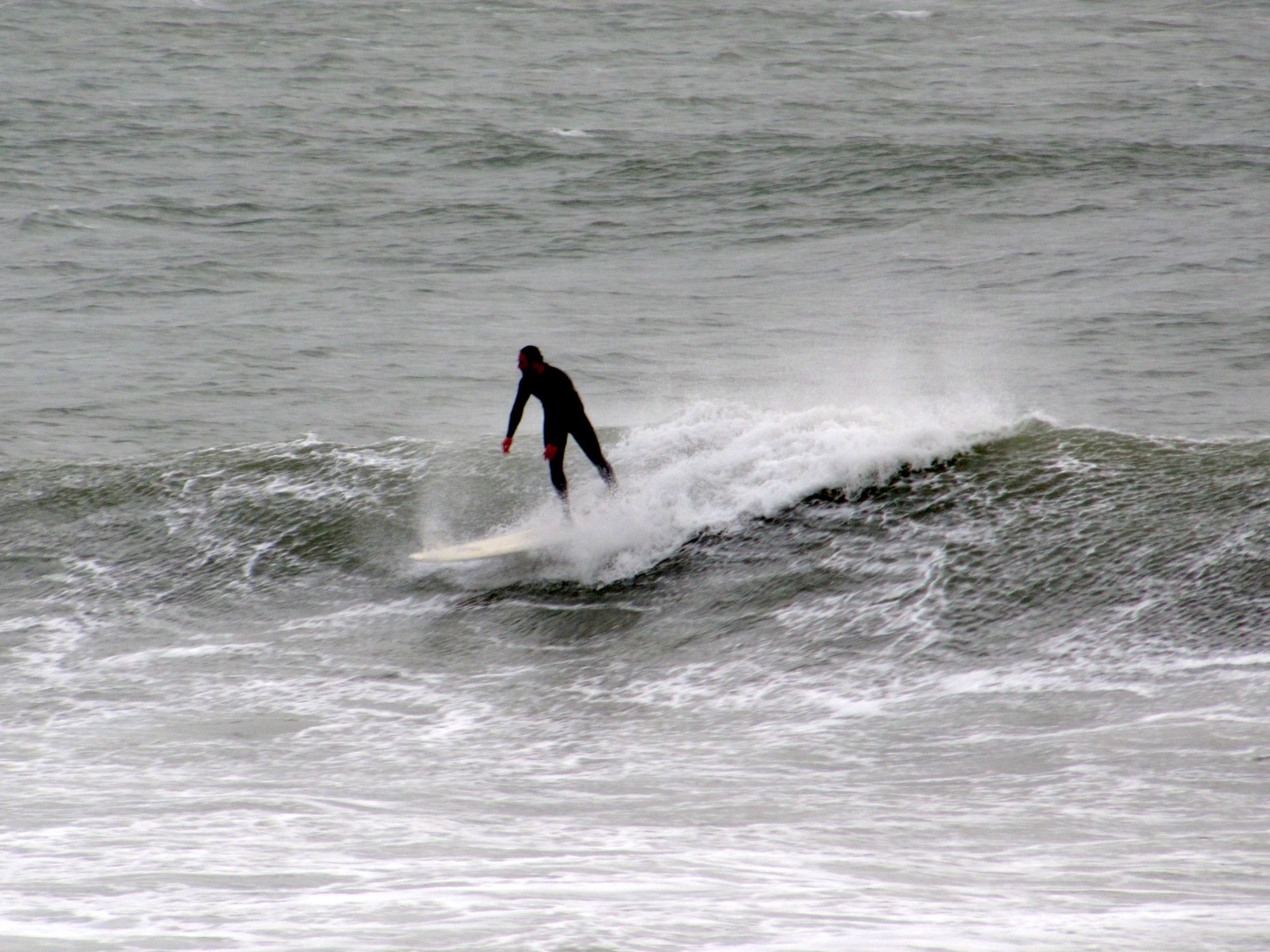 a surfer rides on top of the waves in the ocean