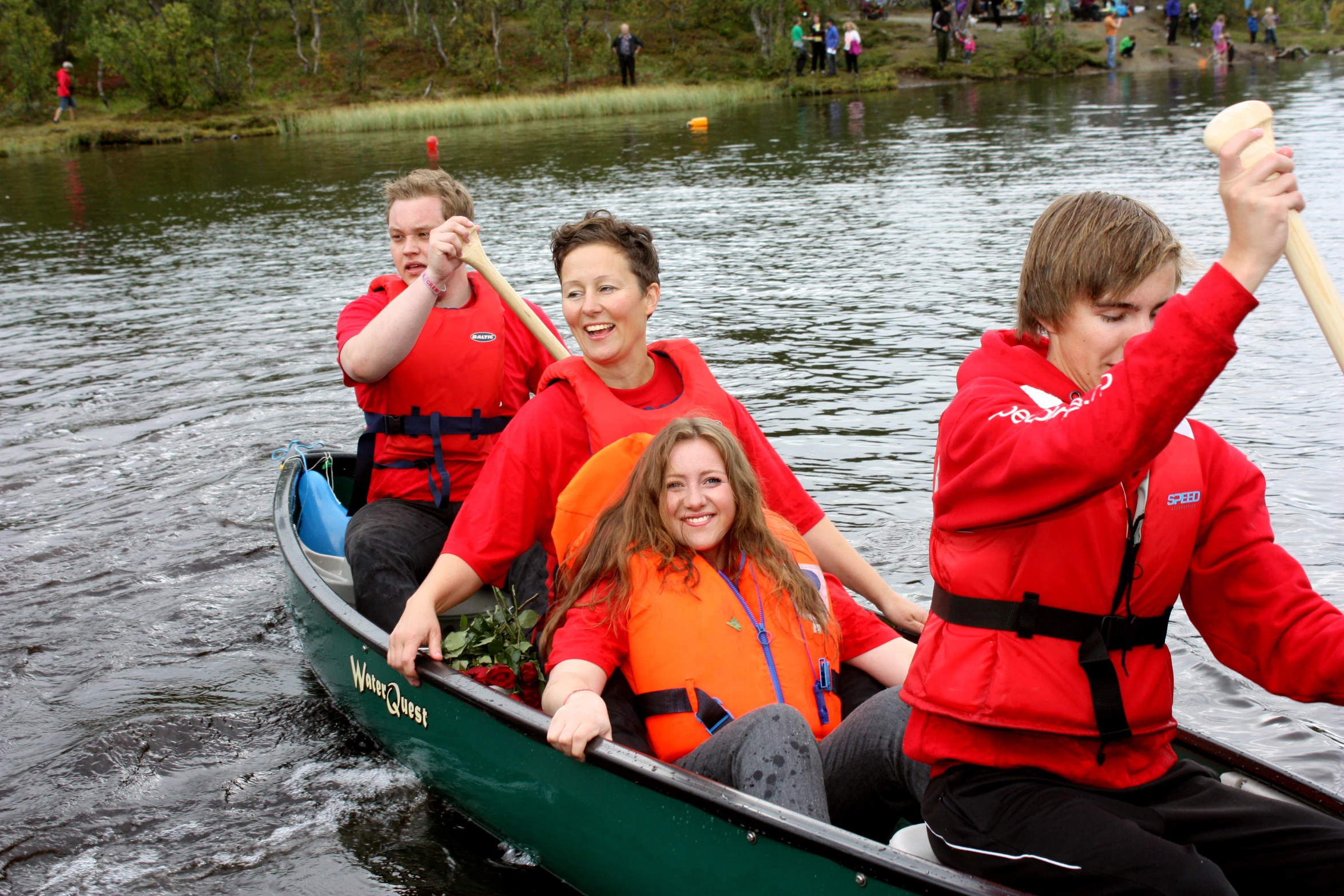 a group of people that are in a boat