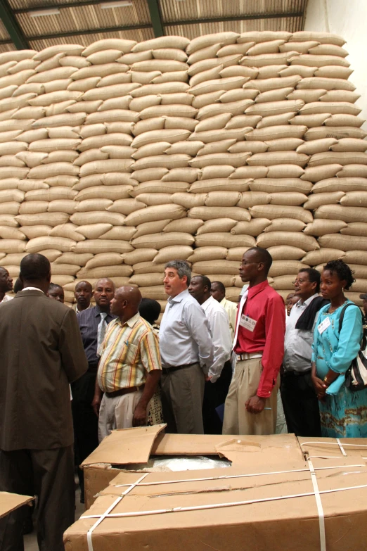 the people are lined up to tour a sand - sack