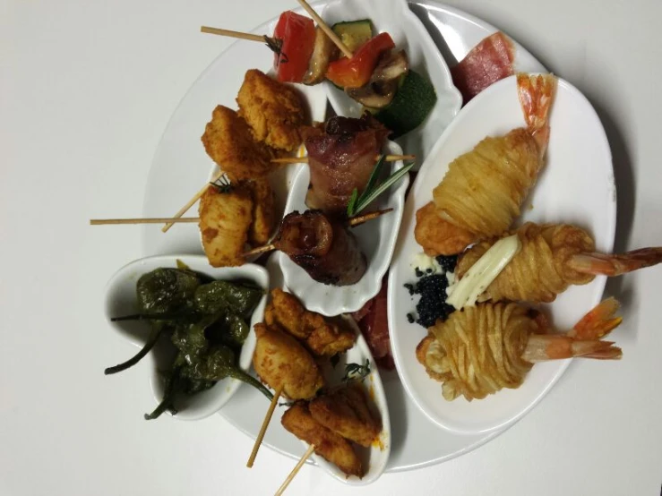 an assortment of food items sitting on a plate