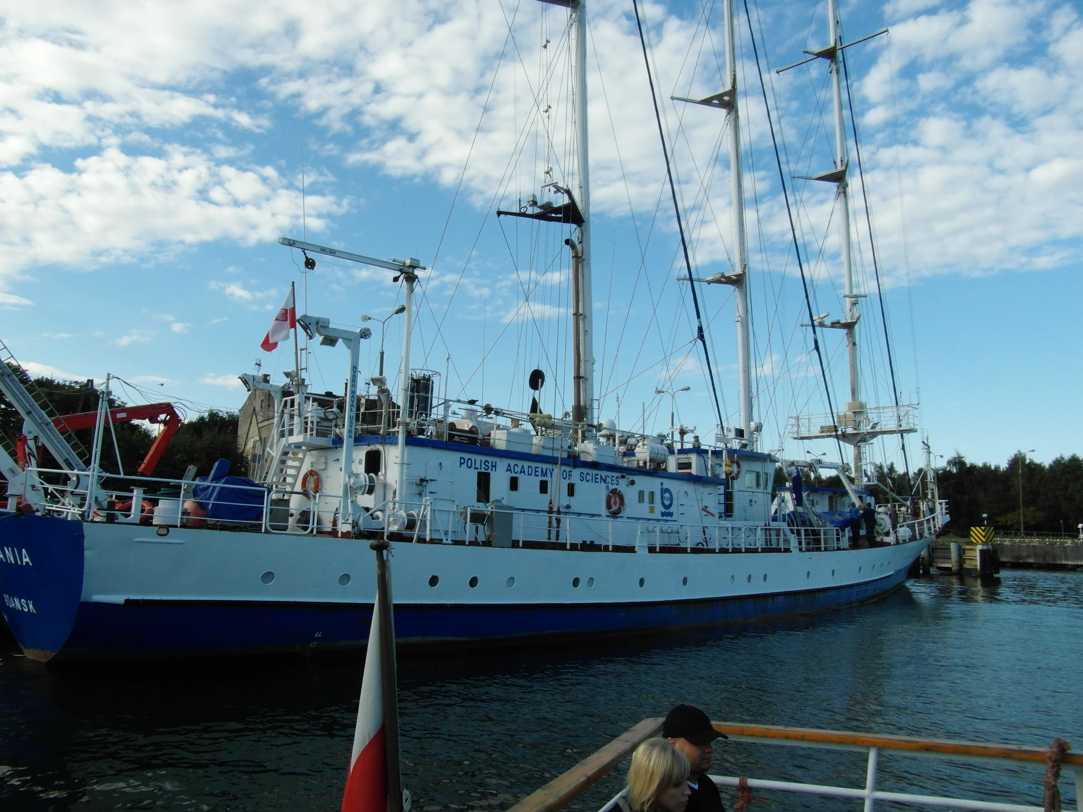 a large boat in the water with a sky background