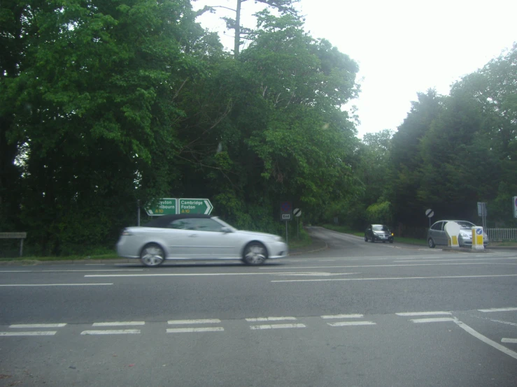 a car is driving down the highway in motion