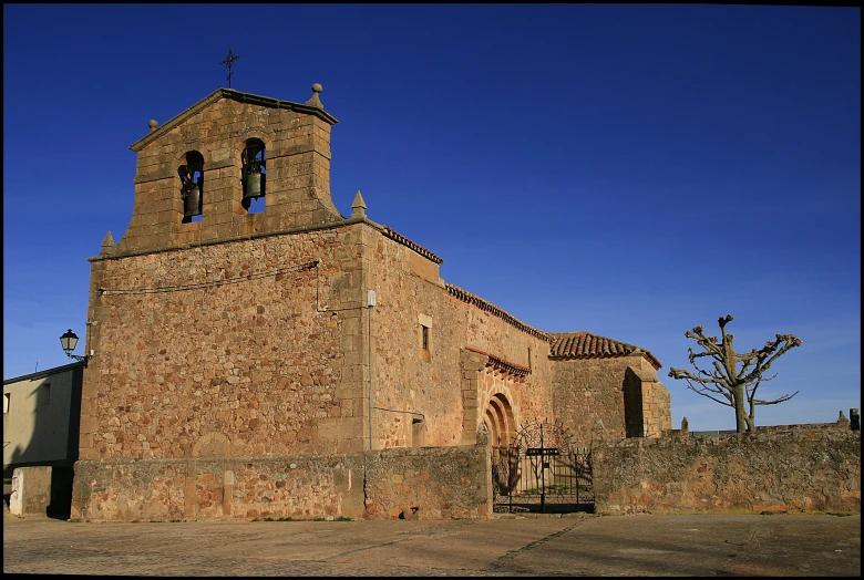 the outside of an old church built in brick